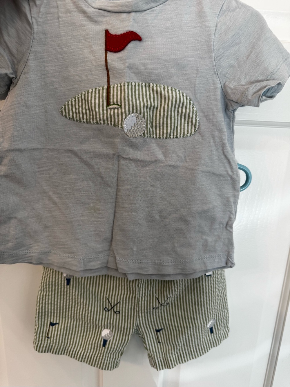 Mudpie 2 piece golf shirt and shorts size 2T